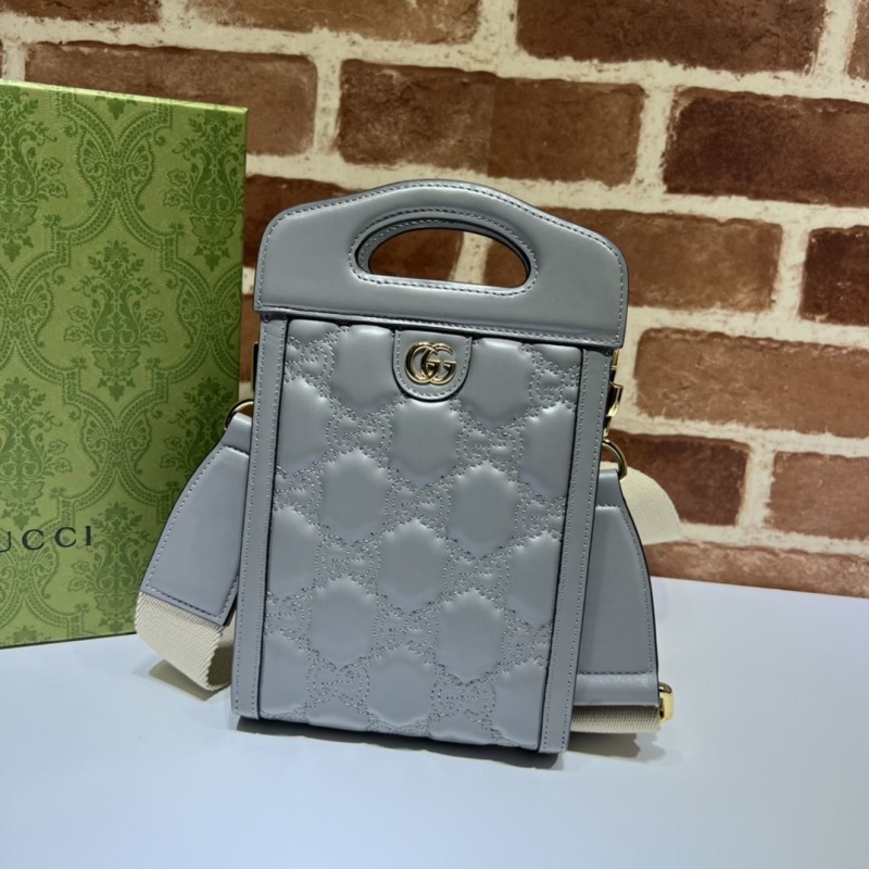 G*u*i top handle bags